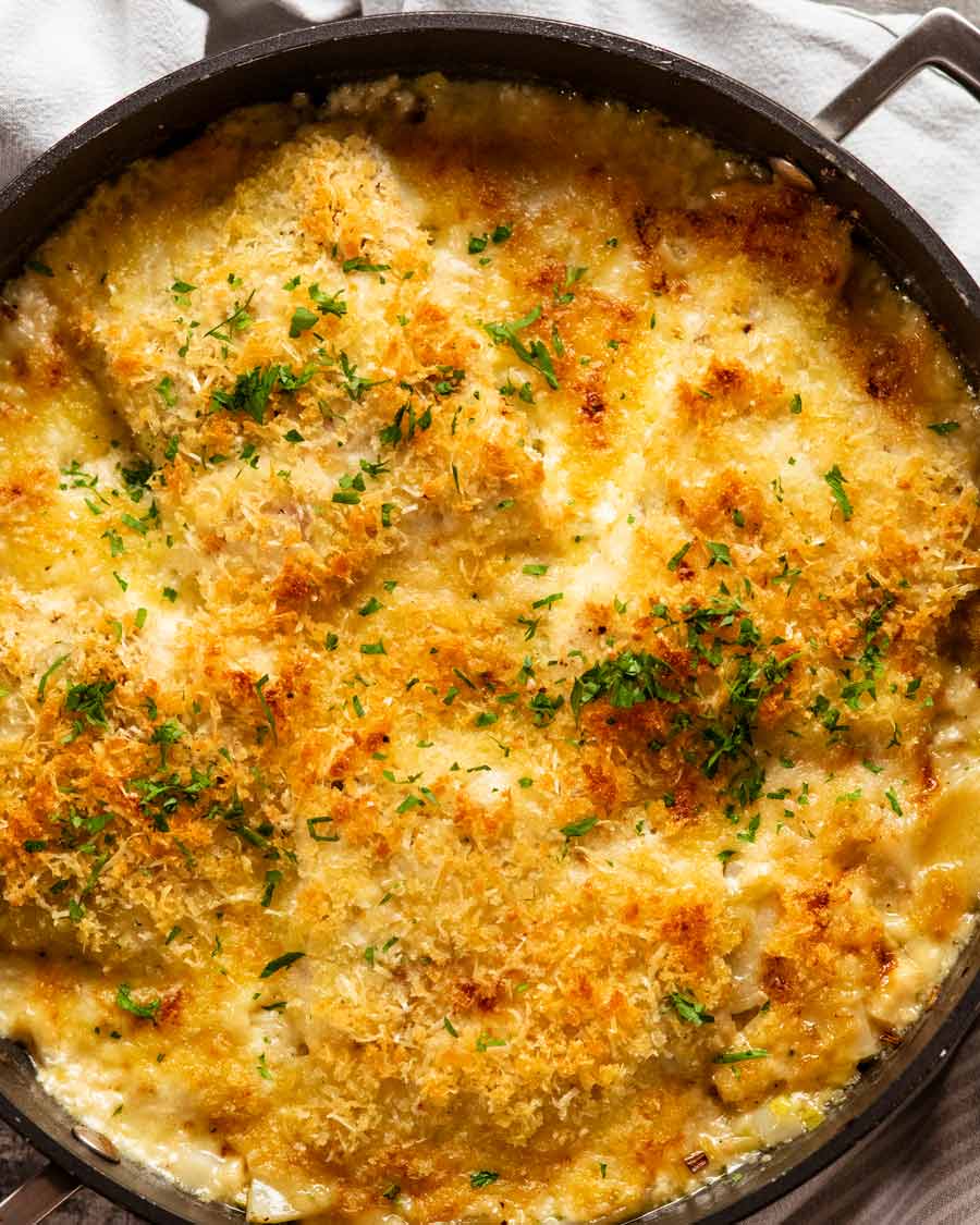 Creamy fish on potato gratin fresh out of the oven