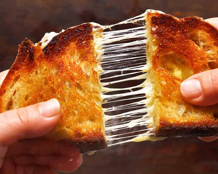 Grilled cheese- ultimate cheese toastie cheese pull