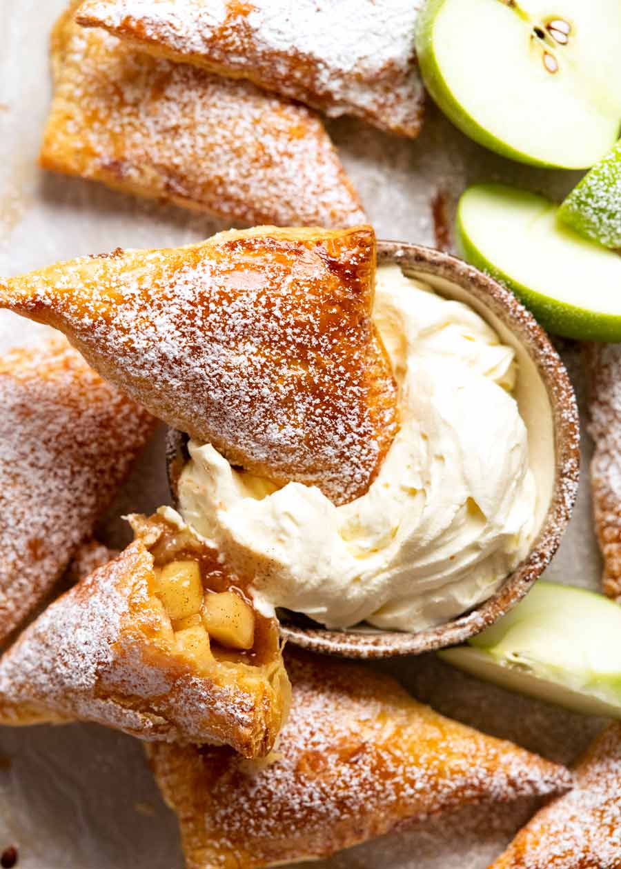 Dunking Apple turnovers in cream
