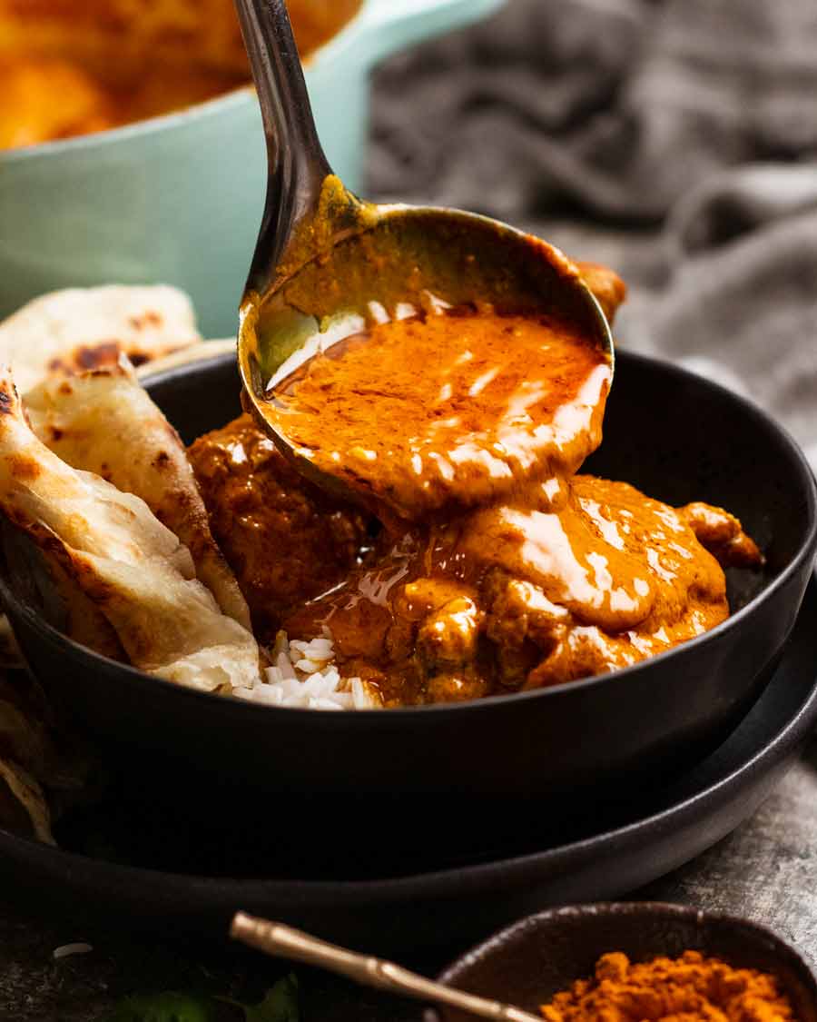 Serving Kuku Paka (African chicken curry)