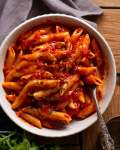 Bowl of Penne all'arrabbiata (spicy herb  pasta)